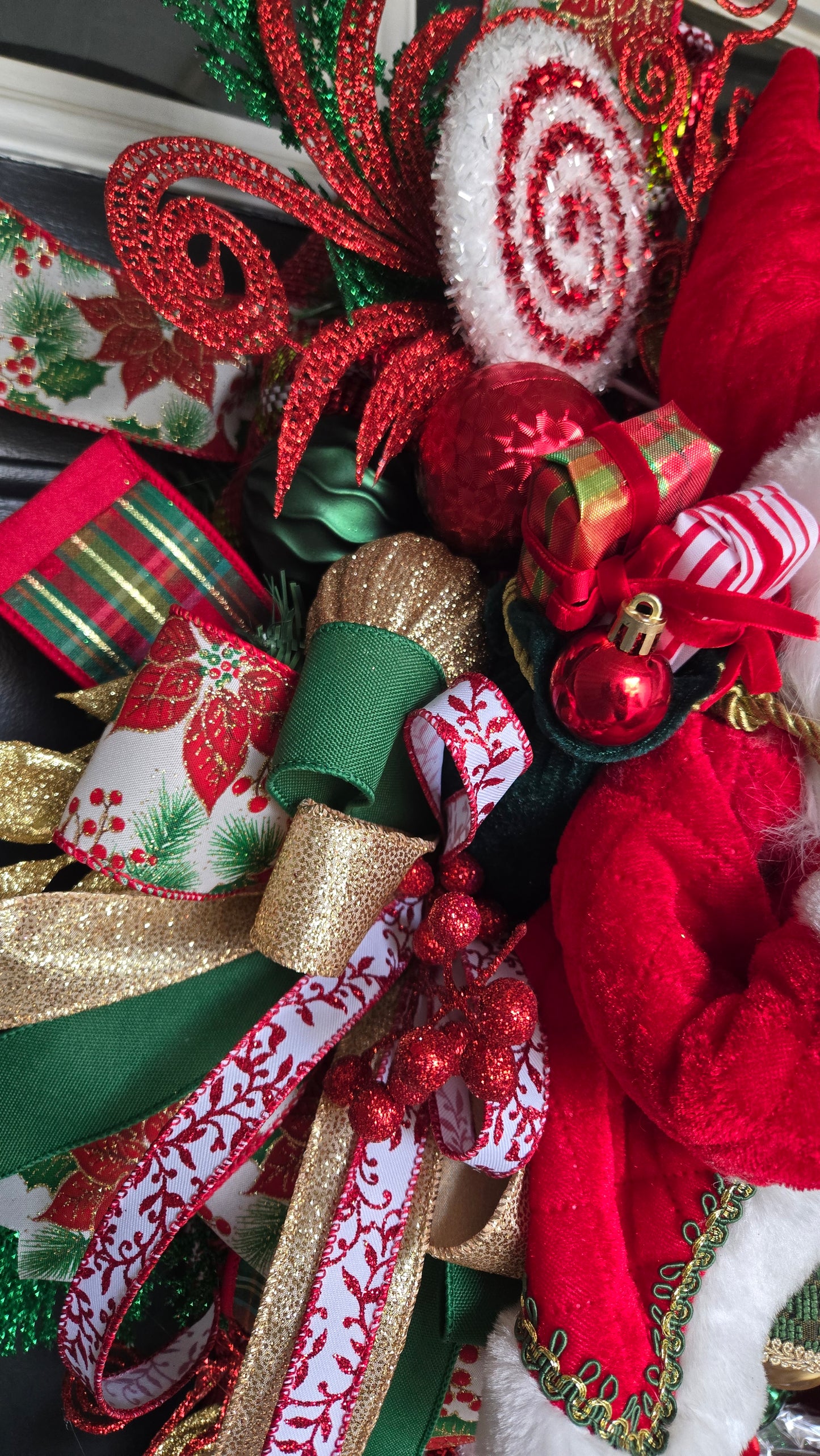 Santa Claus Christmas Swag – Holiday Door Swag with Santa Figurine, Ribbons, Candy Canes & Ornaments