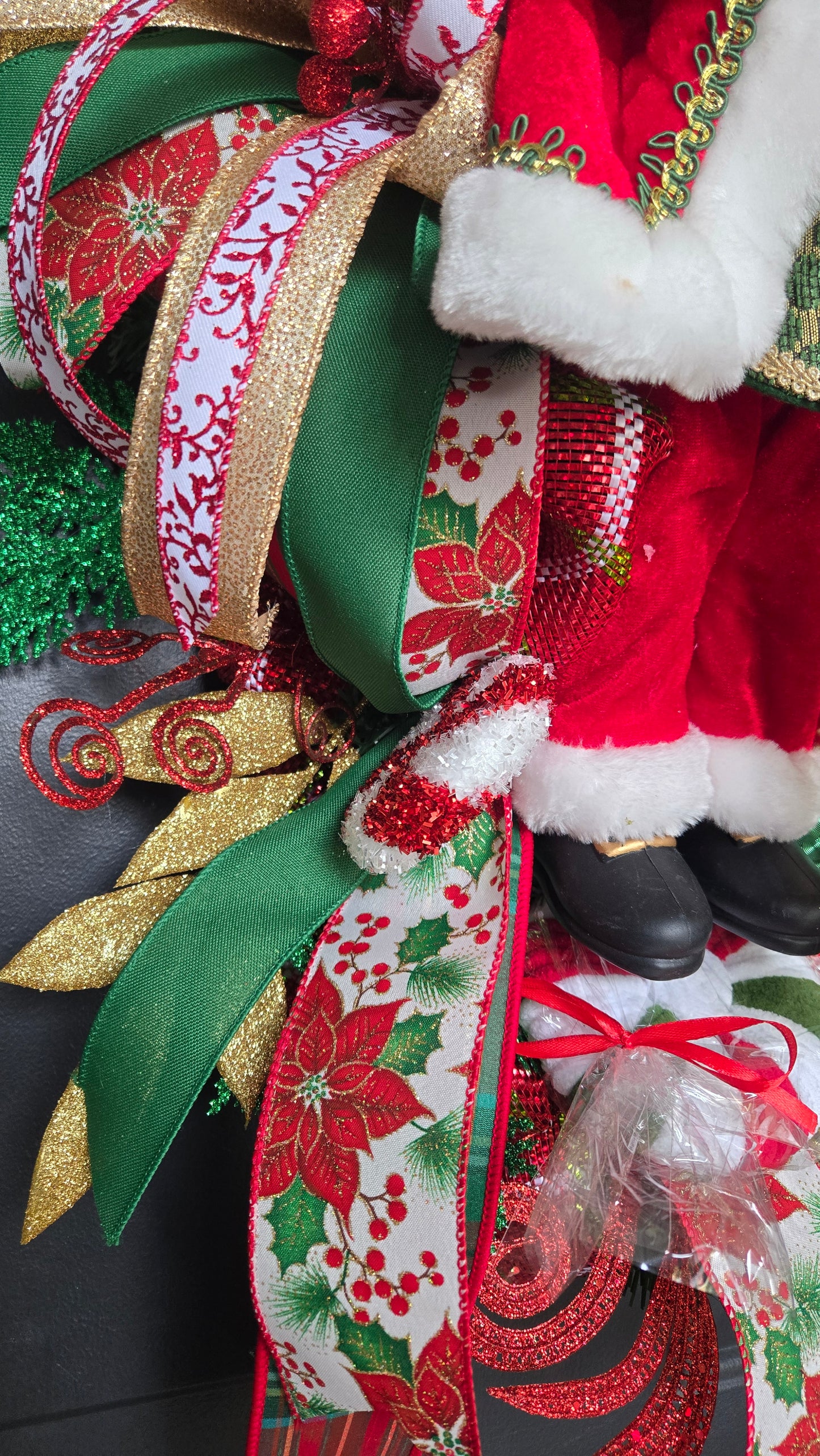 Santa Claus Christmas Swag – Holiday Door Swag with Santa Figurine, Ribbons, Candy Canes & Ornaments